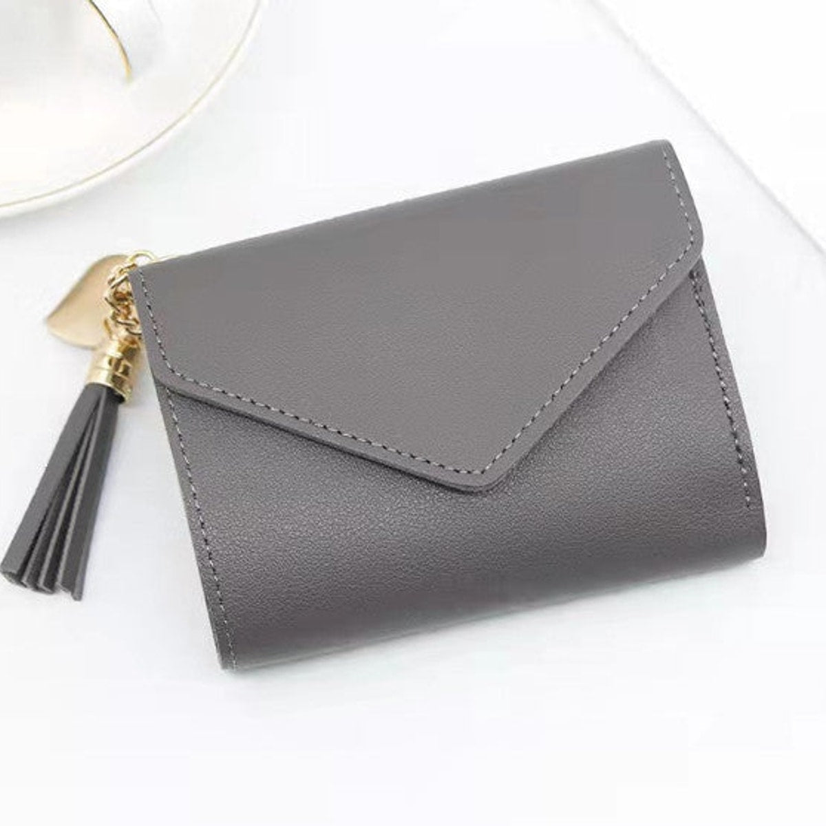 Portefeuille FEMME avec pompon Gris