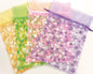 Sachet en organza 23x16cm floqué de fleurs